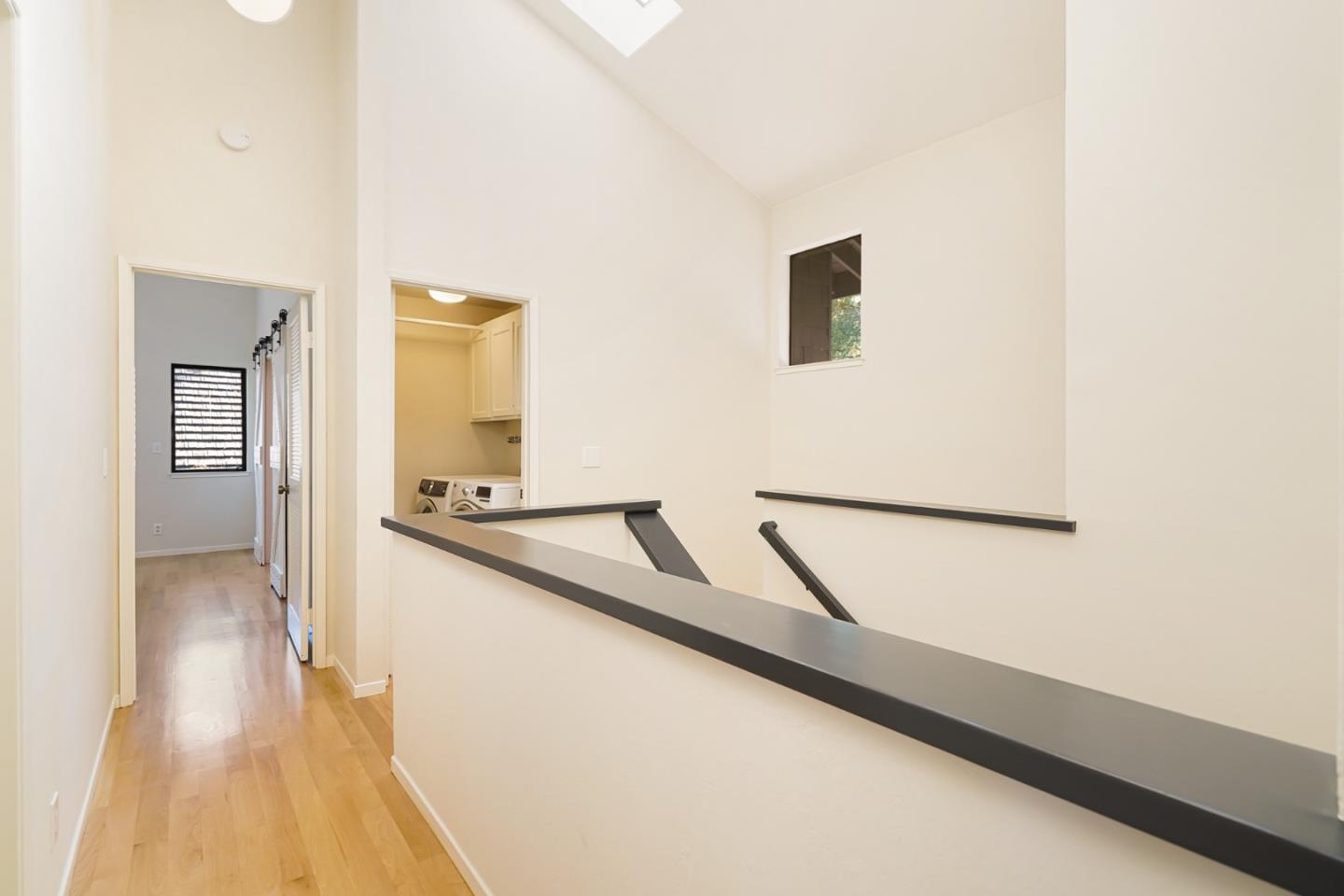 2499 Alpine Road Menlo Park, CA 94025 - Photo 21 of 53 a view of a hallway with wooden floor