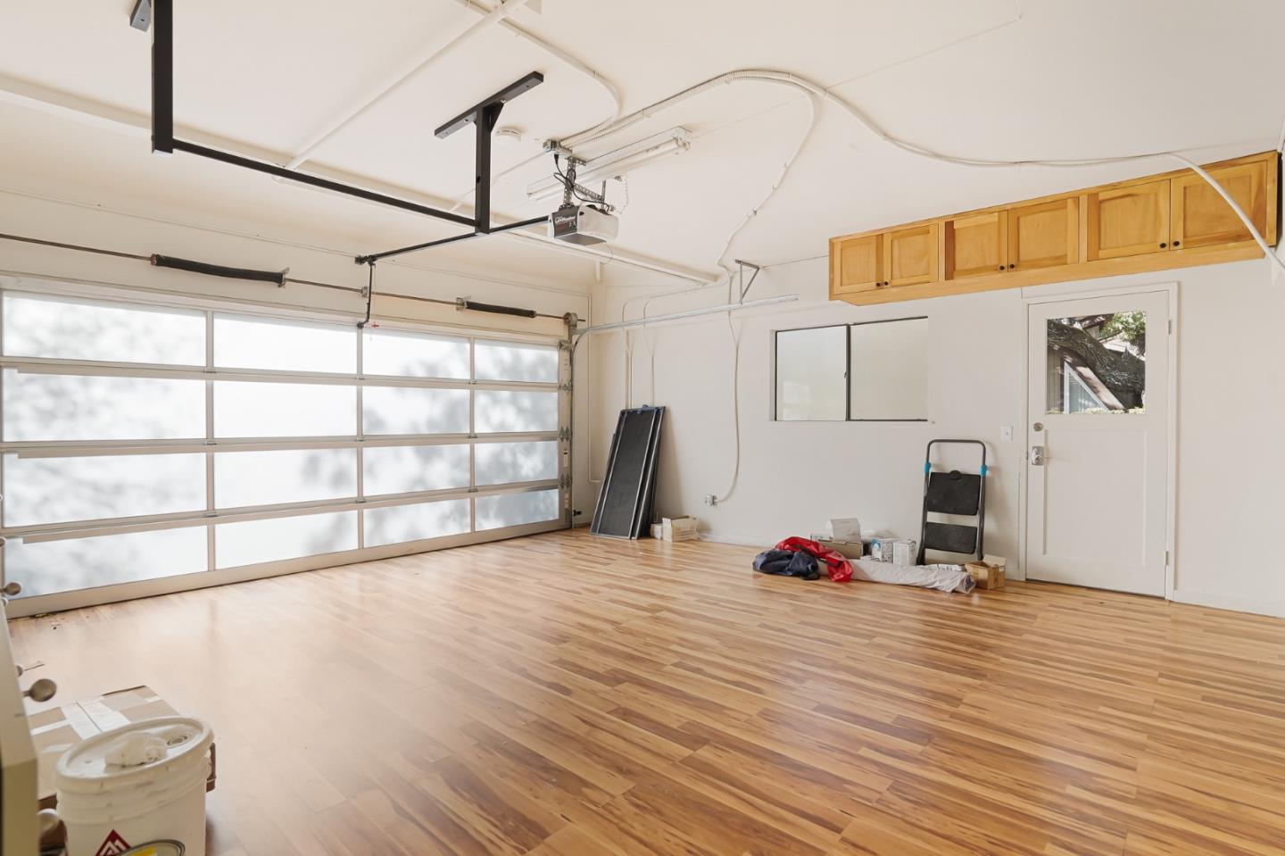 2499 Alpine Road Menlo Park, CA 94025 - Photo 49 of 53 a view of a room with wooden floor and furniture