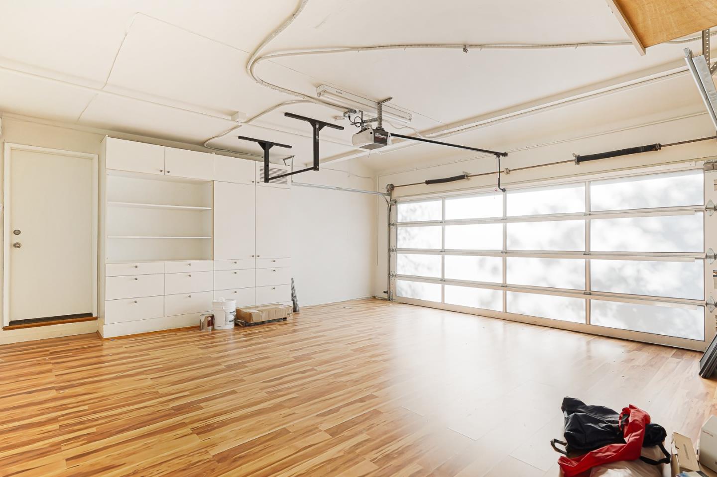 2499 Alpine Road Menlo Park, CA 94025 - Photo 50 of 53 a view of a room with wooden floor and windows
