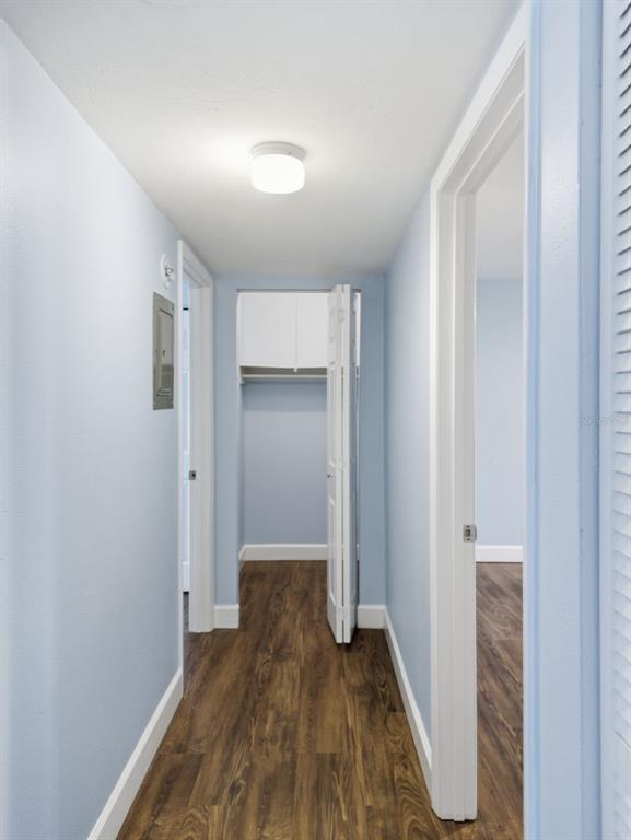 6519 West Newberry Road, Unit 1006 Gainesville, FL 32605 - Photo 18 of 31 a view of hallway with wooden floor