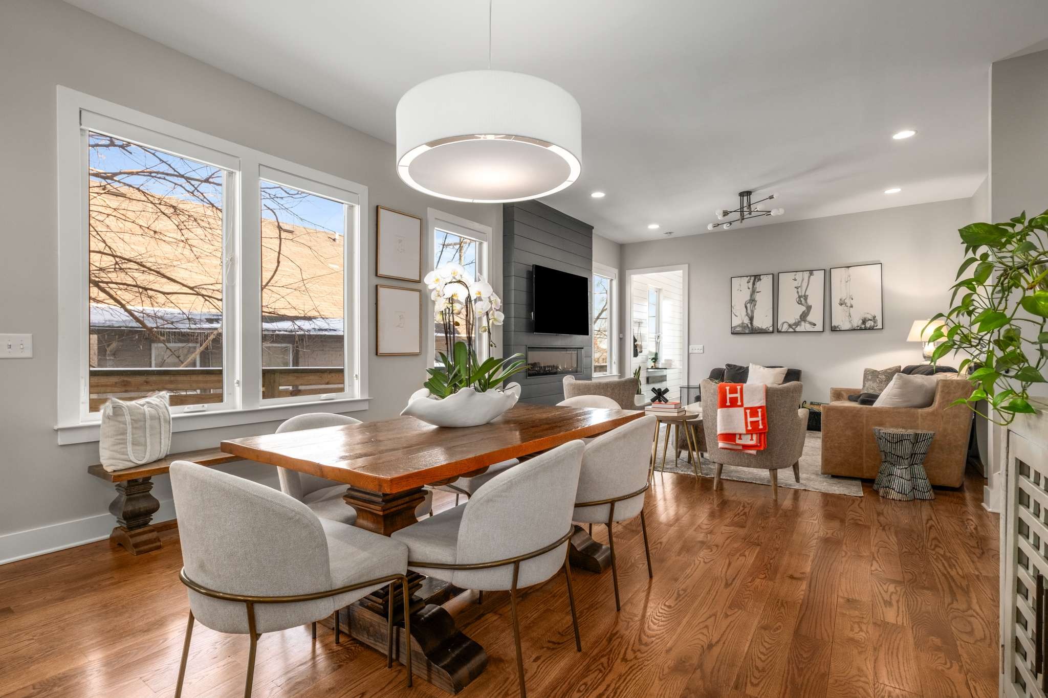 115 Rains Avenue, Unit A Nashville, TN 37203 - Photo 17 of 46 a view of a dining room with furniture window and wooden floor