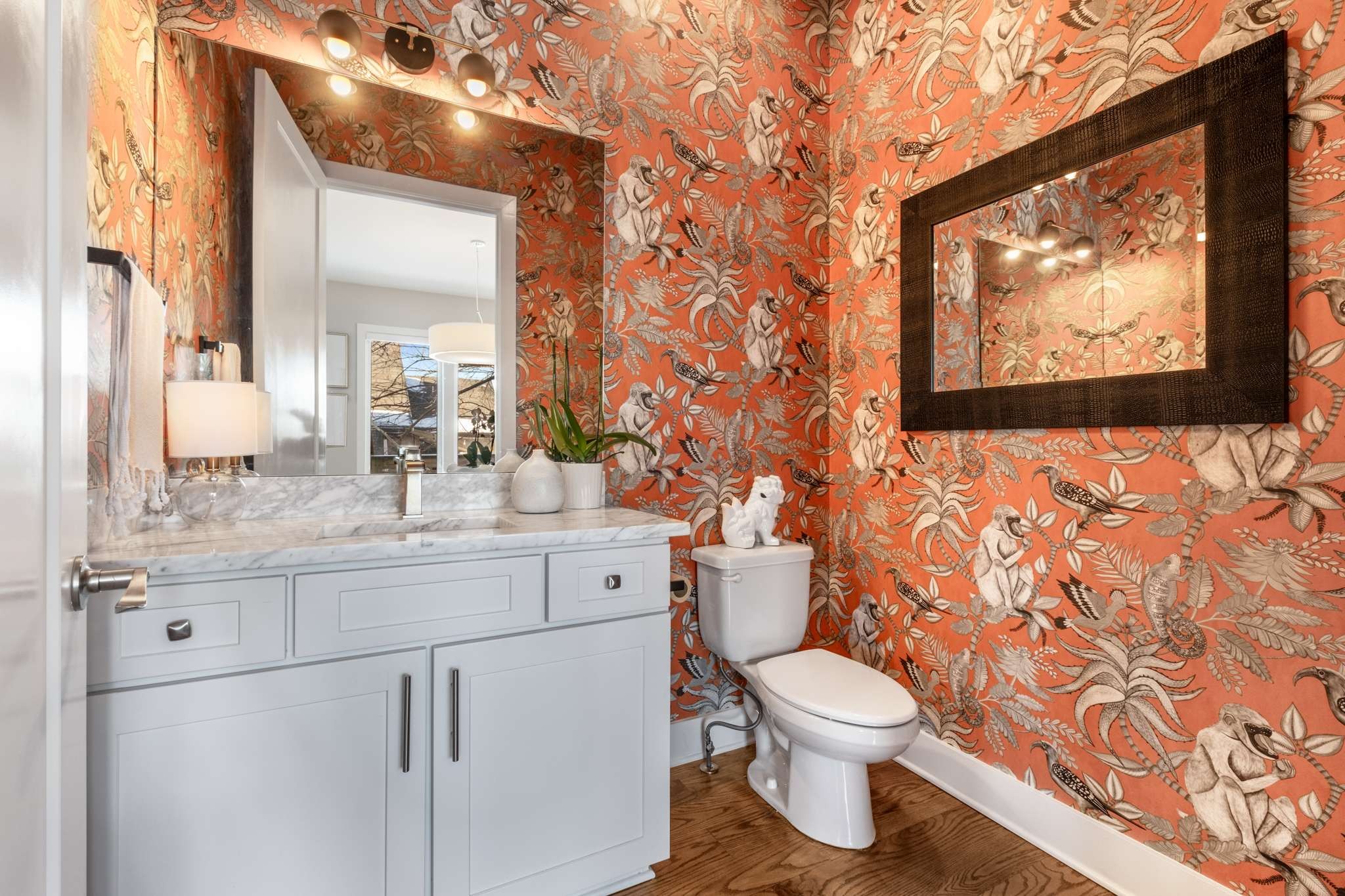 115 Rains Avenue, Unit A Nashville, TN 37203 - Photo 19 of 46 a bathroom with a granite countertop toilet and a sink