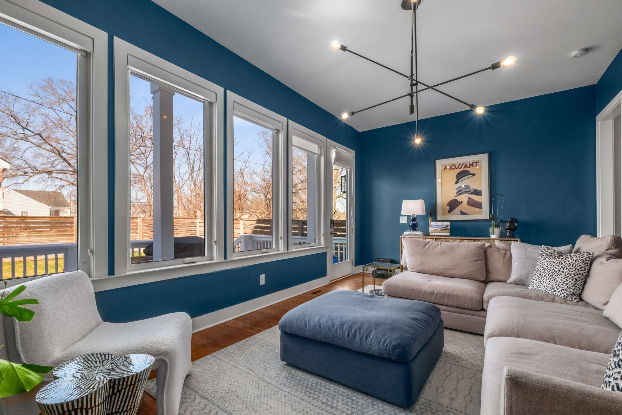 115 Rains Avenue, Unit A Nashville, TN 37203 - Photo 22 of 46 a living room with furniture and a large window