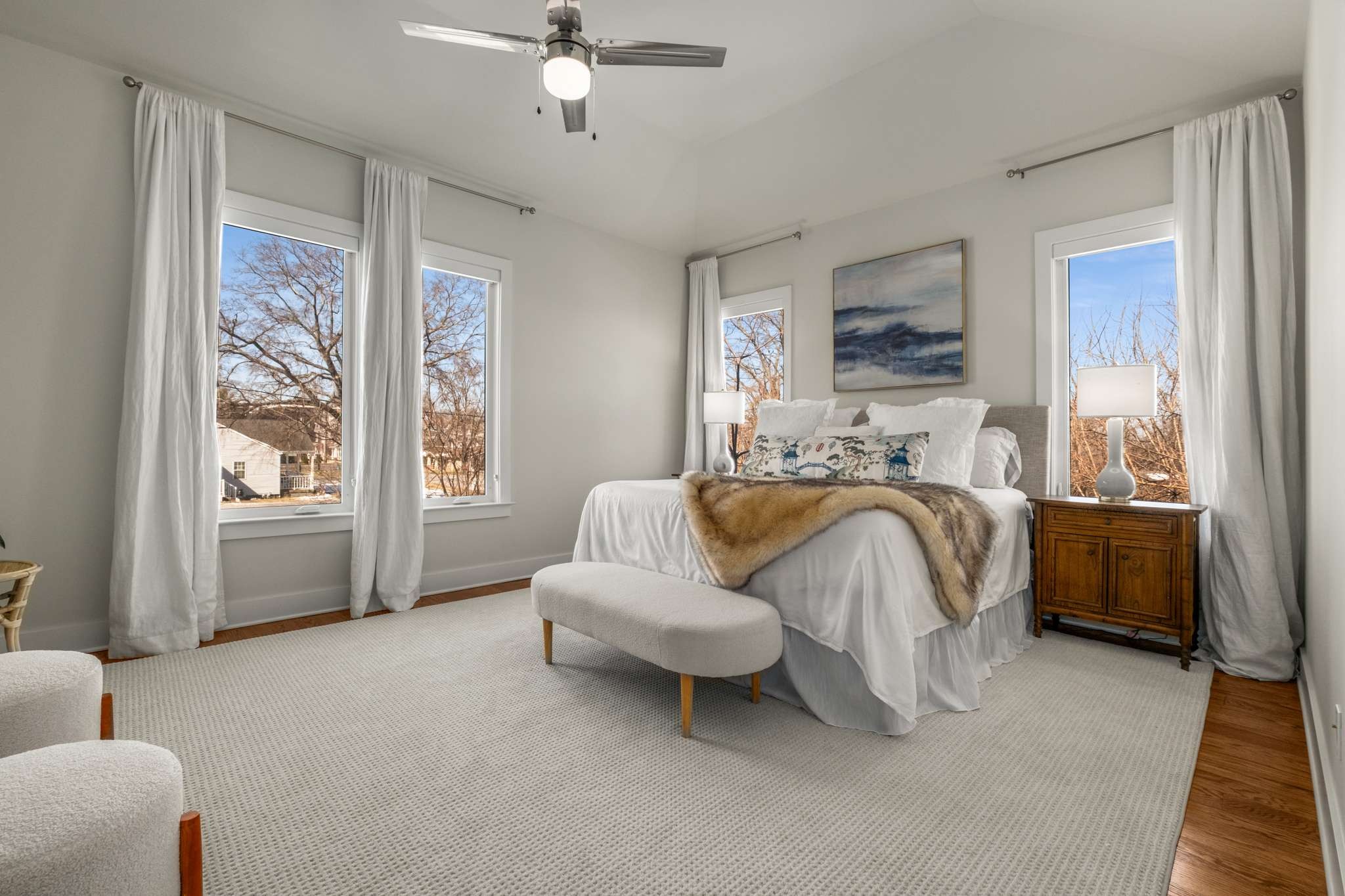 115 Rains Avenue, Unit A Nashville, TN 37203 - Photo 24 of 46 a bed room with a bed and a couch