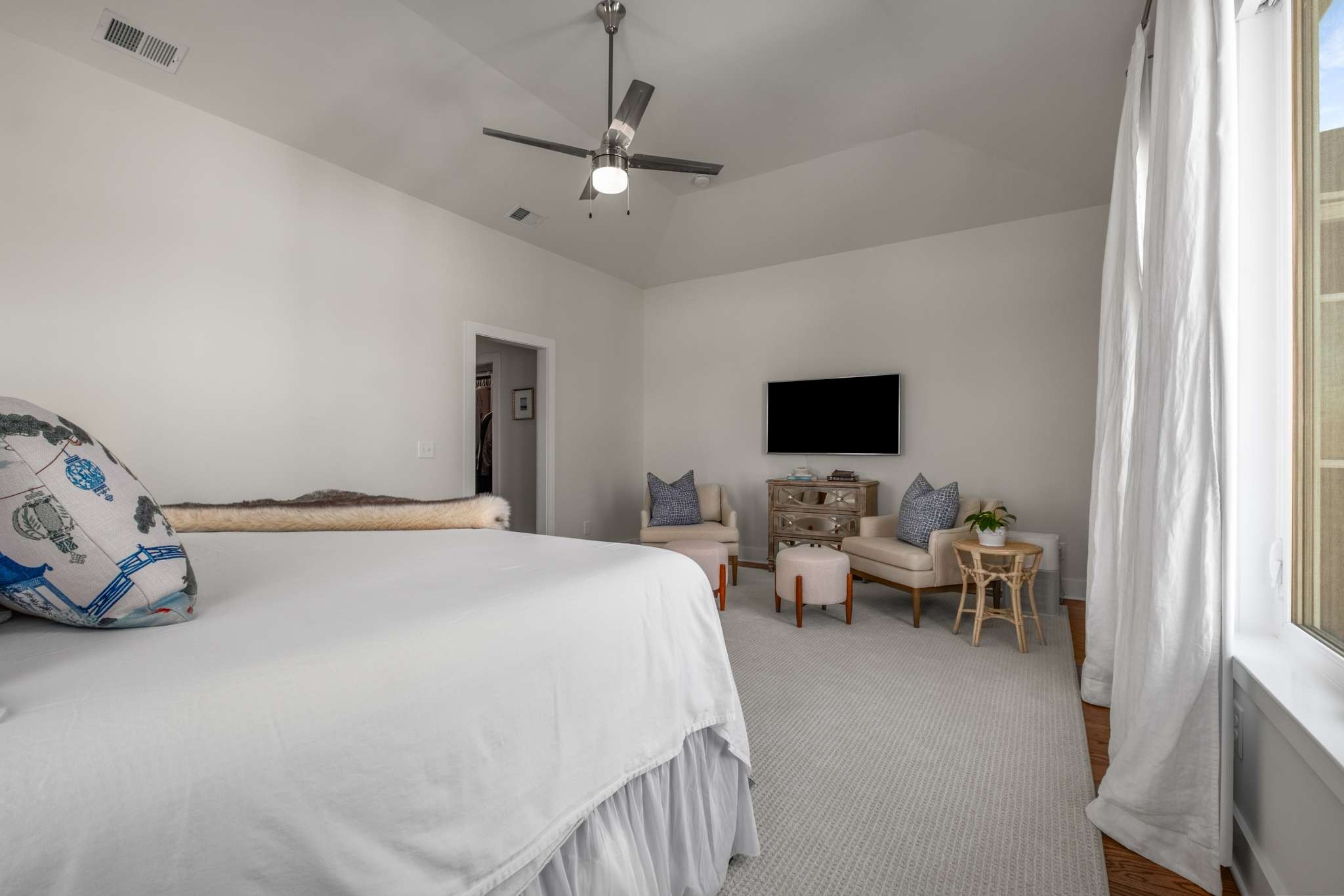 115 Rains Avenue, Unit A Nashville, TN 37203 - Photo 25 of 46 a bedroom with a bed and a flat screen tv