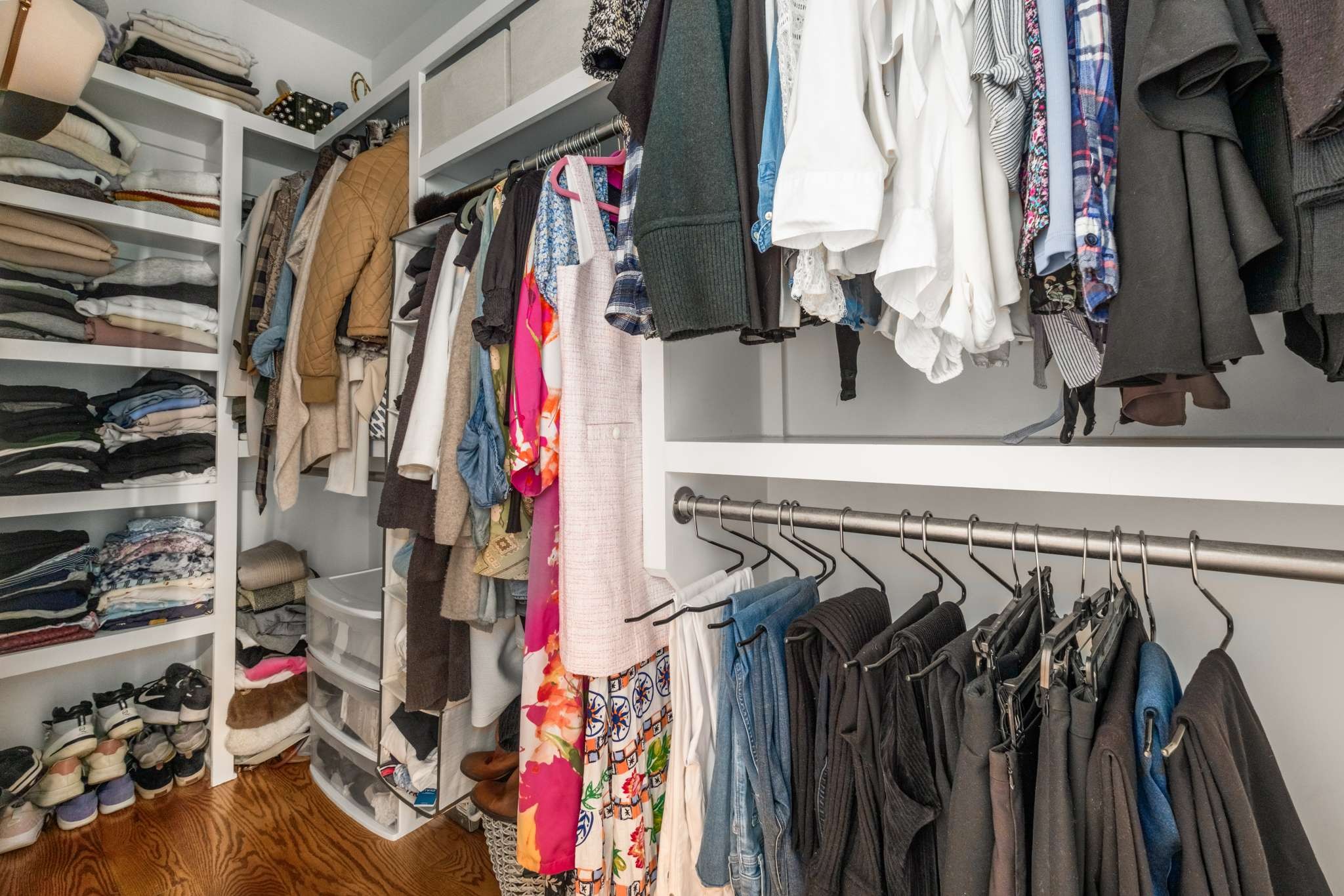 115 Rains Avenue, Unit A Nashville, TN 37203 - Photo 28 of 46 a view of walk in closet with clothes and shoes