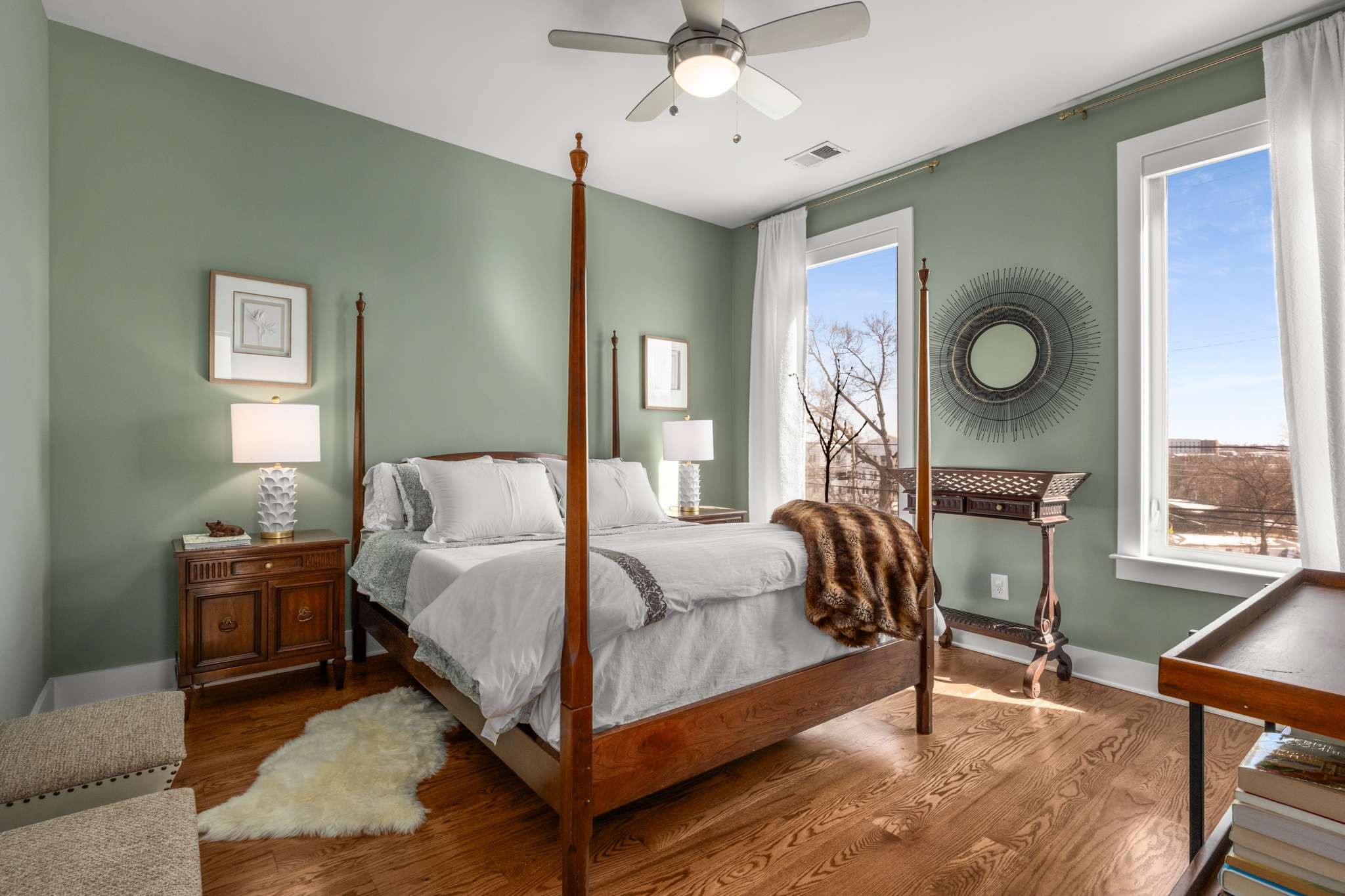 115 Rains Avenue, Unit A Nashville, TN 37203 - Photo 30 of 46 a bedroom with a bed window and a table