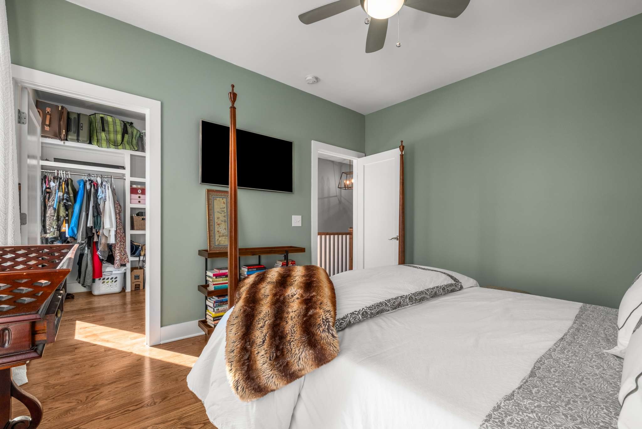 115 Rains Avenue, Unit A Nashville, TN 37203 - Photo 31 of 46 a bedroom with a bed and a flat screen tv