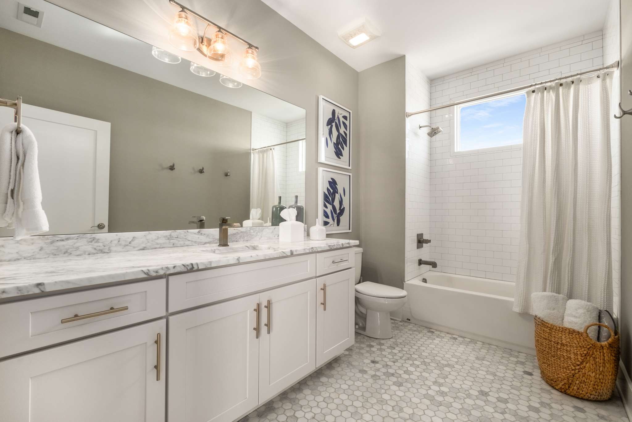 115 Rains Avenue, Unit A Nashville, TN 37203 - Photo 32 of 46 a bathroom with a granite countertop sink toilet and shower