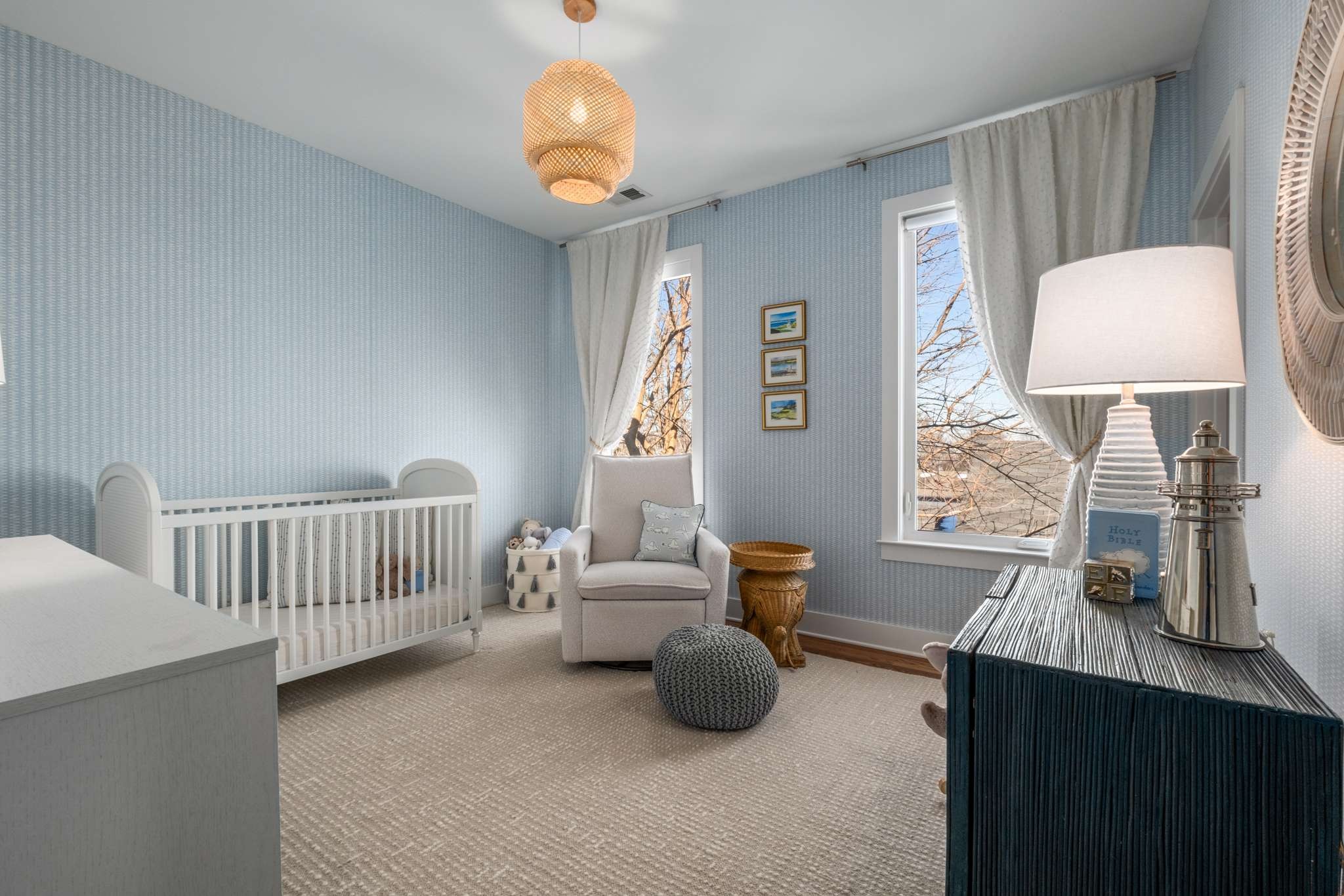 115 Rains Avenue, Unit A Nashville, TN 37203 - Photo 33 of 46 a bedroom with furniture and a window