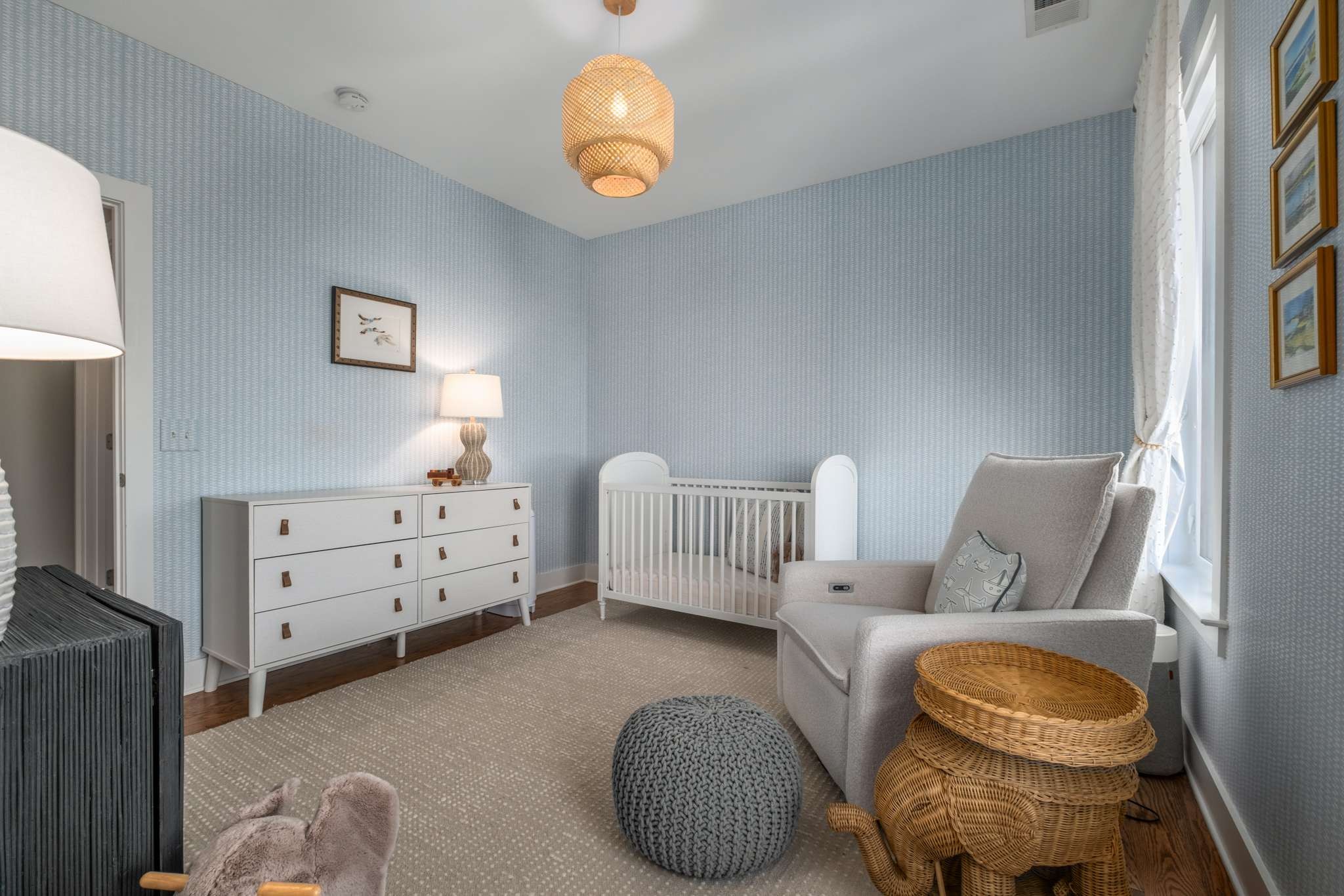 115 Rains Avenue, Unit A Nashville, TN 37203 - Photo 34 of 46 a bedroom with furniture and a window