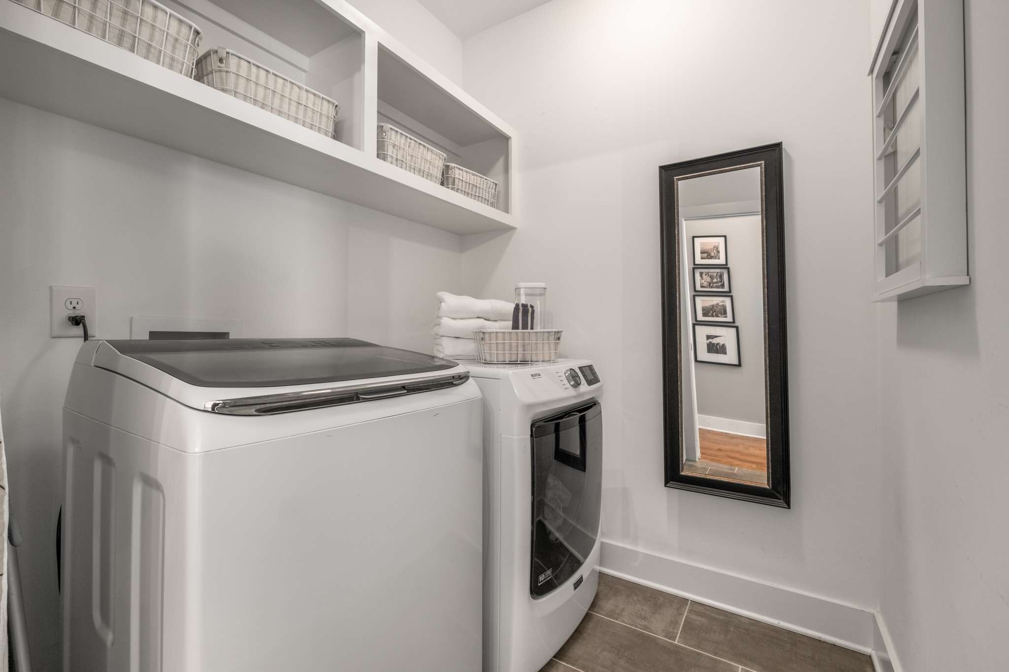 115 Rains Avenue, Unit A Nashville, TN 37203 - Photo 36 of 46 a utility room with dryer and washer