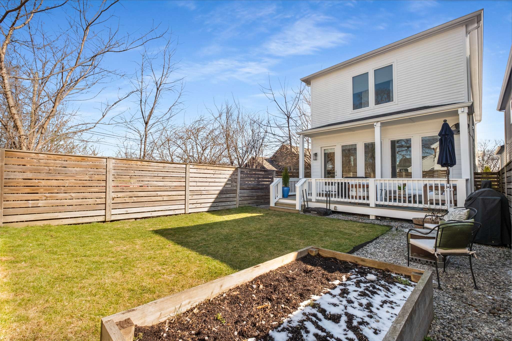115 Rains Avenue, Unit A Nashville, TN 37203 - Photo 42 of 46 a view of a house with a backyard