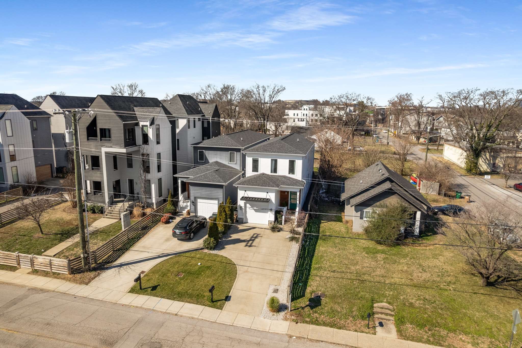 115 Rains Avenue, Unit A Nashville, TN 37203 - Photo 44 of 46 a view of a house with cars park
