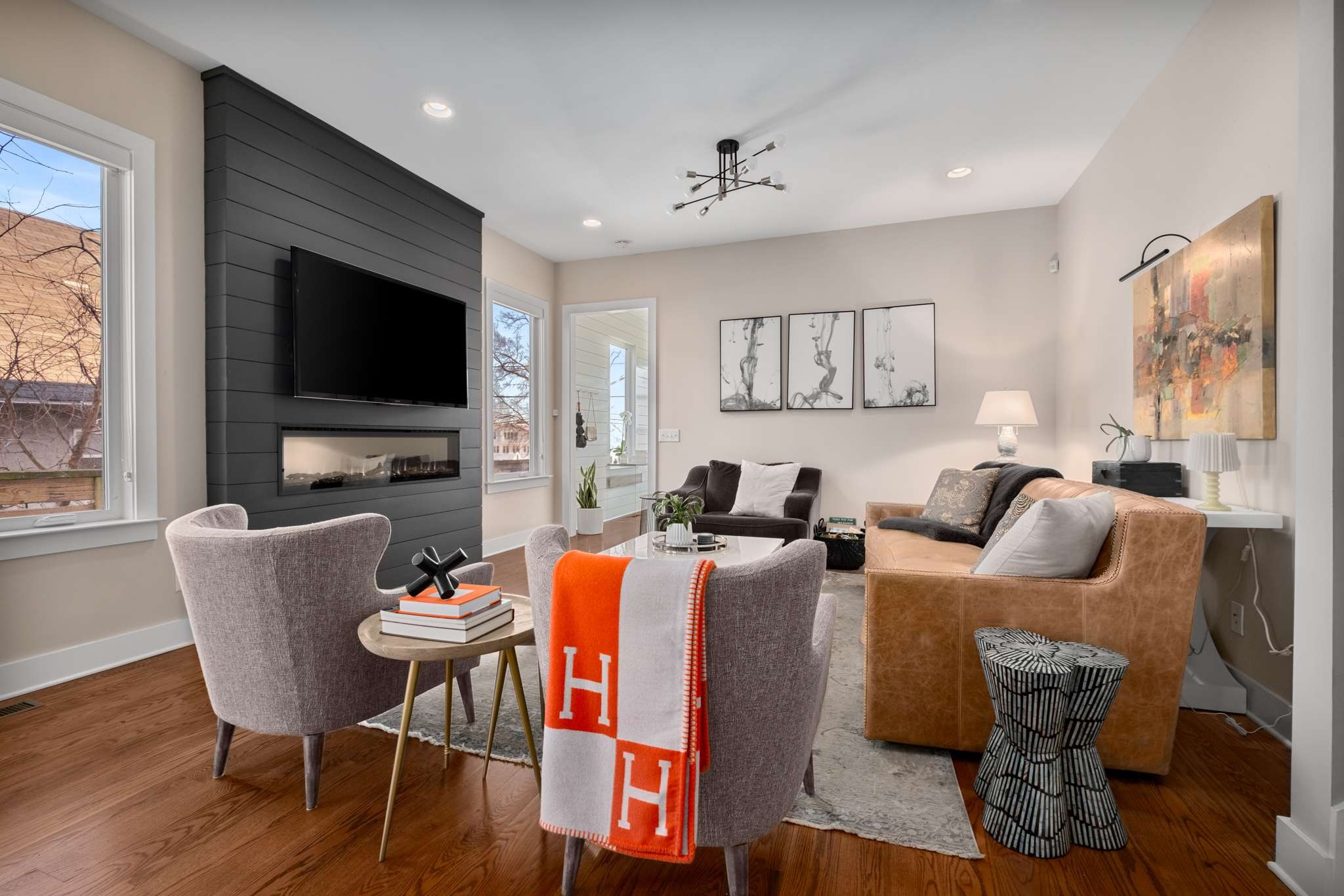 115 Rains Avenue, Unit A Nashville, TN 37203 - Photo 9 of 46 a living room with fireplace furniture and a flat screen tv