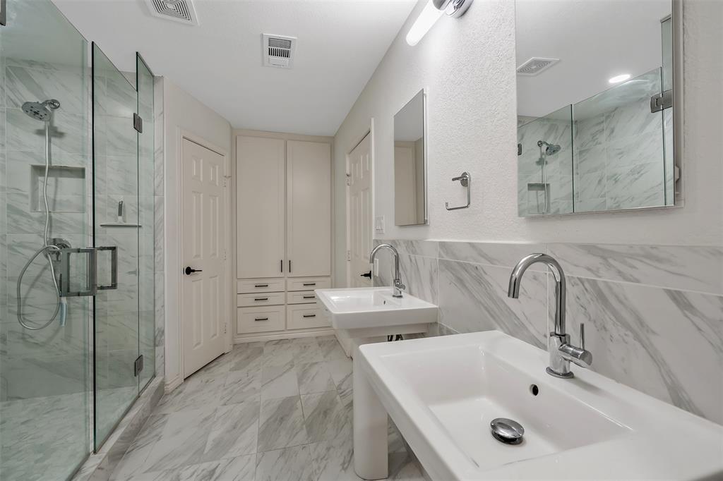 300 Rash Lane Terrell, TX 75160 - Photo 15 of 28 a bathroom with a sink and a mirror