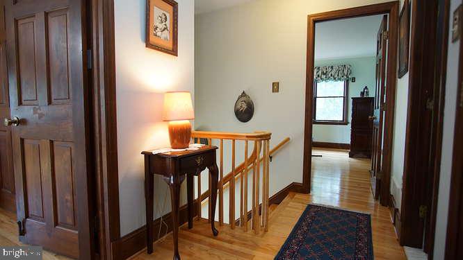 3817 Boteler Road Mount Airy, MD 21771 - Photo 22 of 66 Upstairs hall with oak flooring