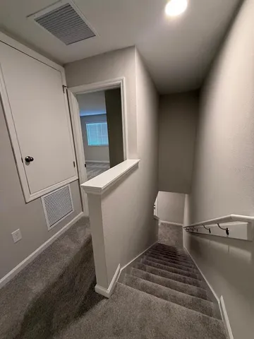 a bathroom with a toilet and a sink