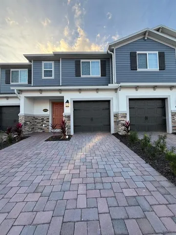 a view of a house with sitting area