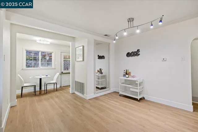 a view of livingroom with furniture and windows
