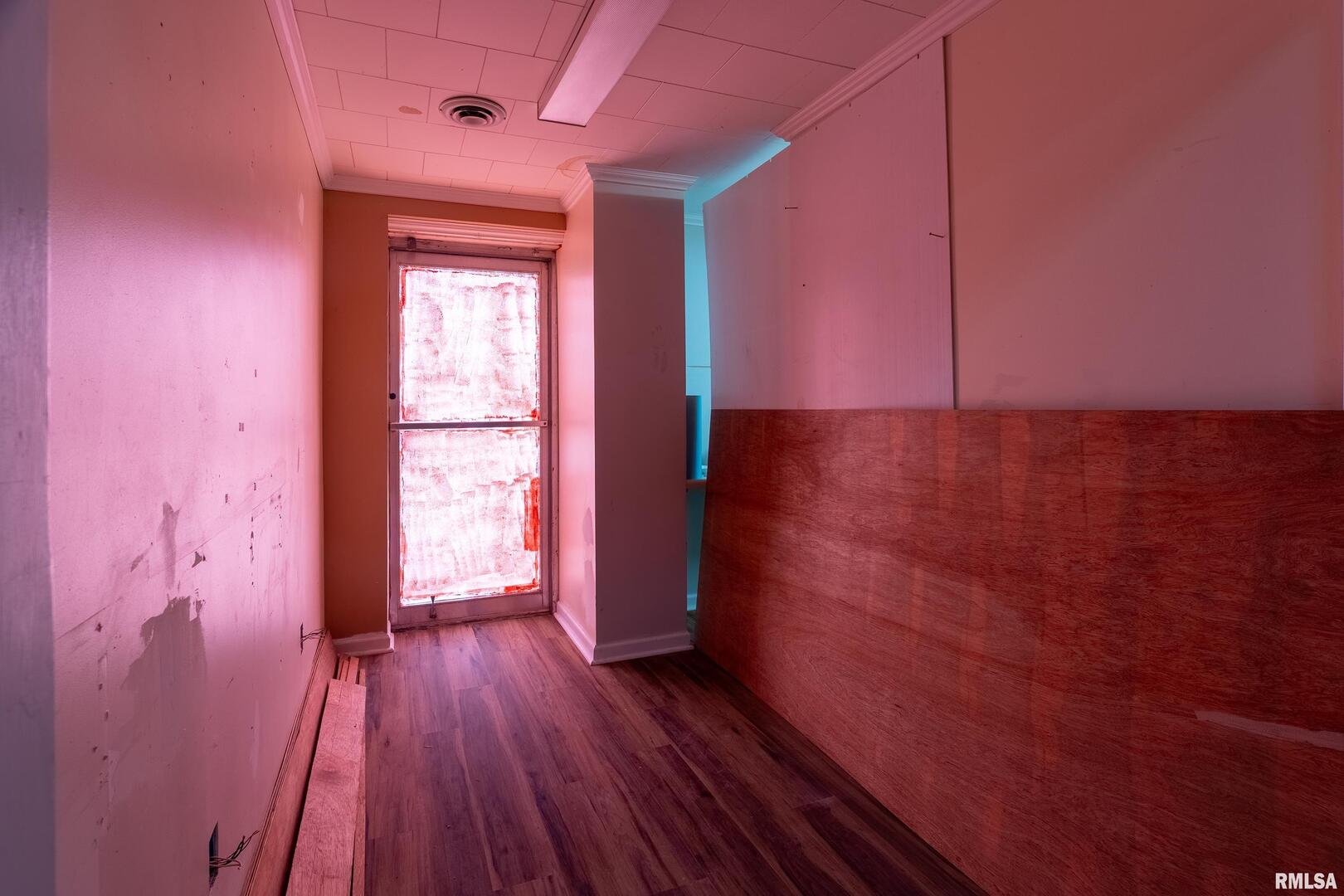 10543 Highway 149 Murphysboro, IL 62966 - Photo 14 of 54 wooden floor in an empty room with a window