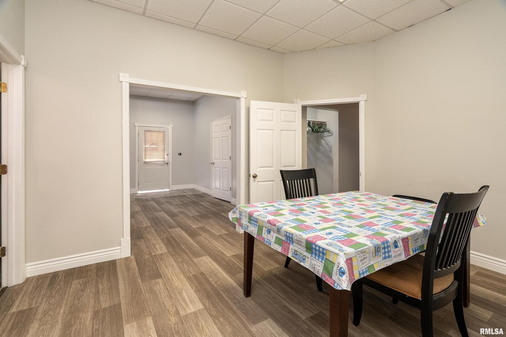 10543 Highway 149 Murphysboro, IL 62966 - Photo 25 of 54 a dining room with a wooden table and chairs