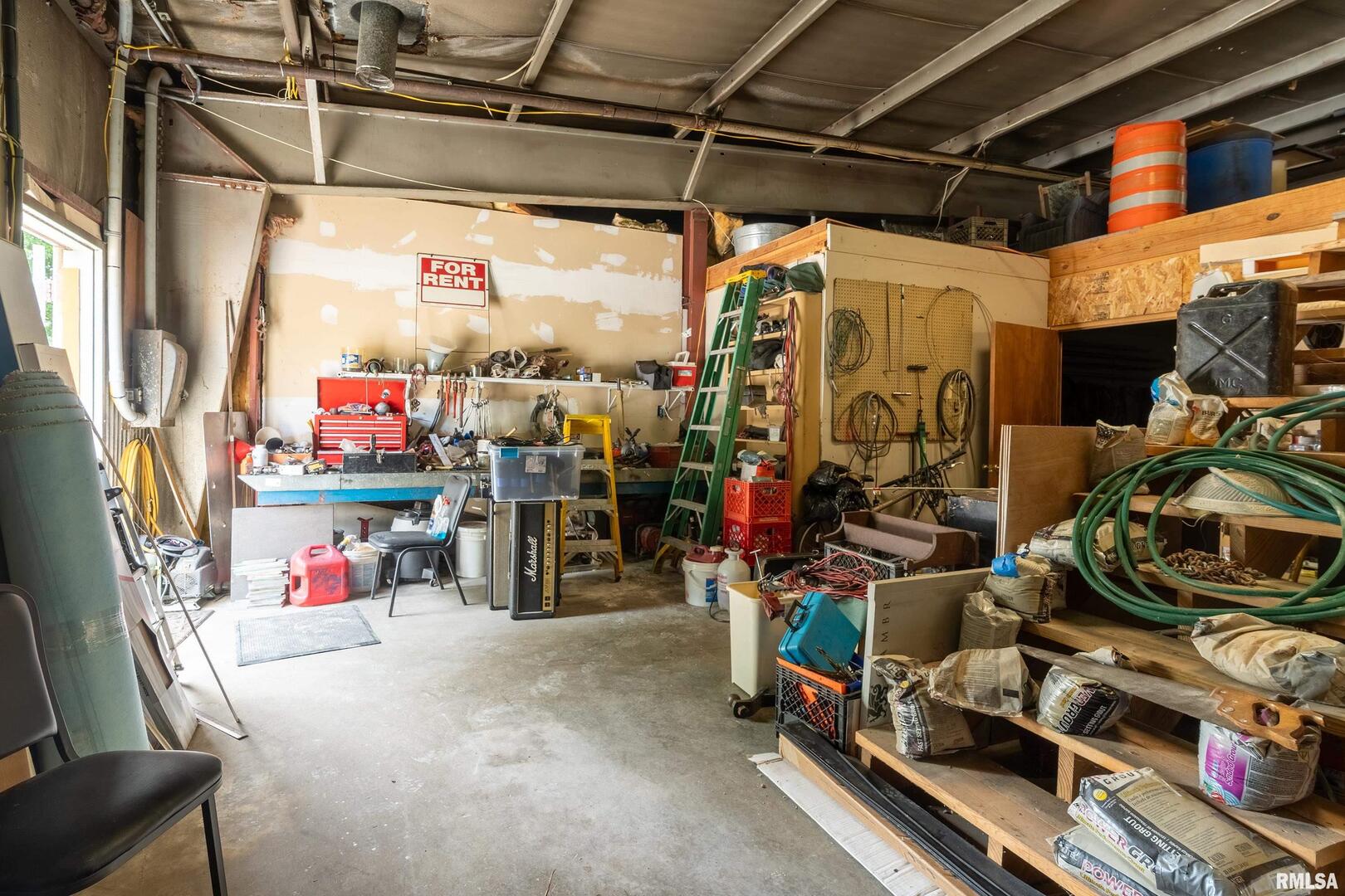 10543 Highway 149 Murphysboro, IL 62966 - Photo 29 of 54 a view of a storage room with clothes
