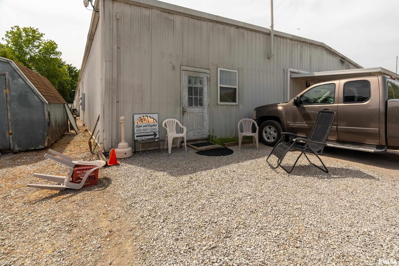 10543 Highway 149 Murphysboro, IL 62966 - Photo 42 of 54 a backyard of a house with seating space