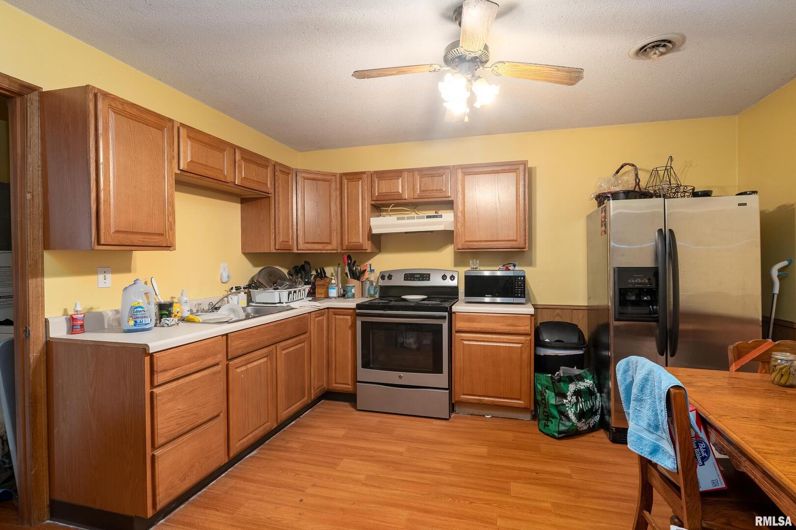 10543 Highway 149 Murphysboro, IL 62966 - Photo 45 of 54 a kitchen with a sink appliances and cabinets