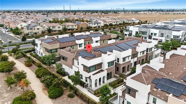 an aerial view of a building with lake view
