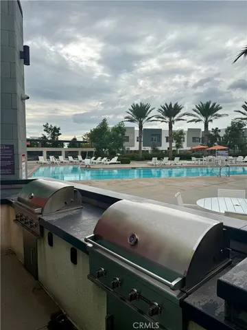 a view of a swimming pool with a terrace