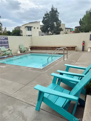 a view of an outdoor dining space with seating area