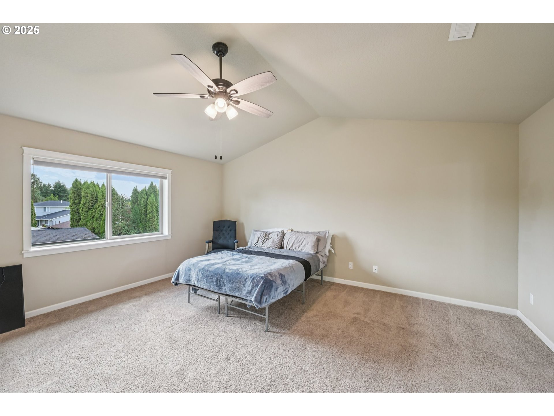 2174 A Street Hubbard, OR 97032 - Photo 11 of 30 a living room with a bed furniture and a large window