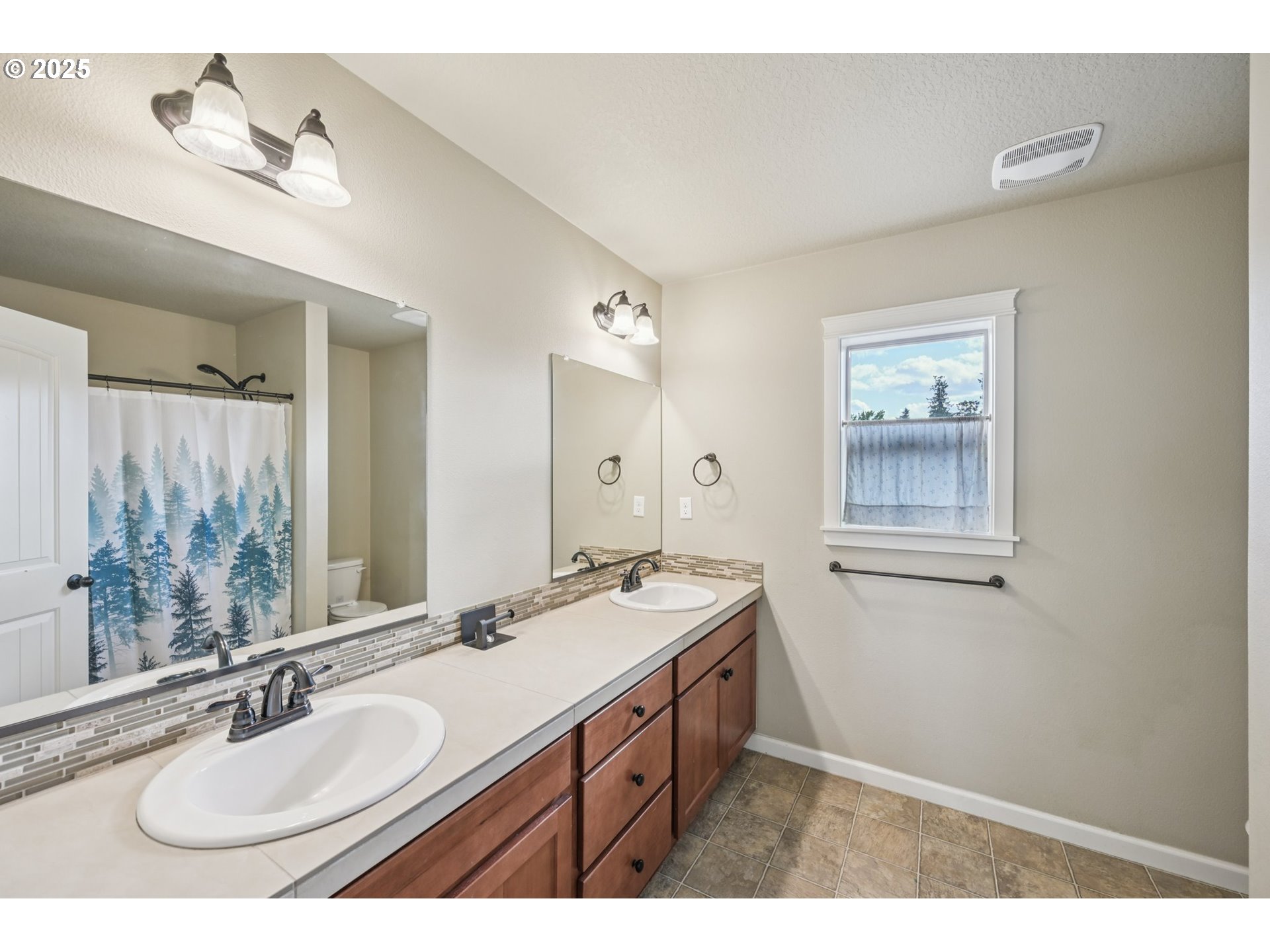 2174 A Street Hubbard, OR 97032 - Photo 20 of 30 a bathroom with a sink double vanity granite and a mirror