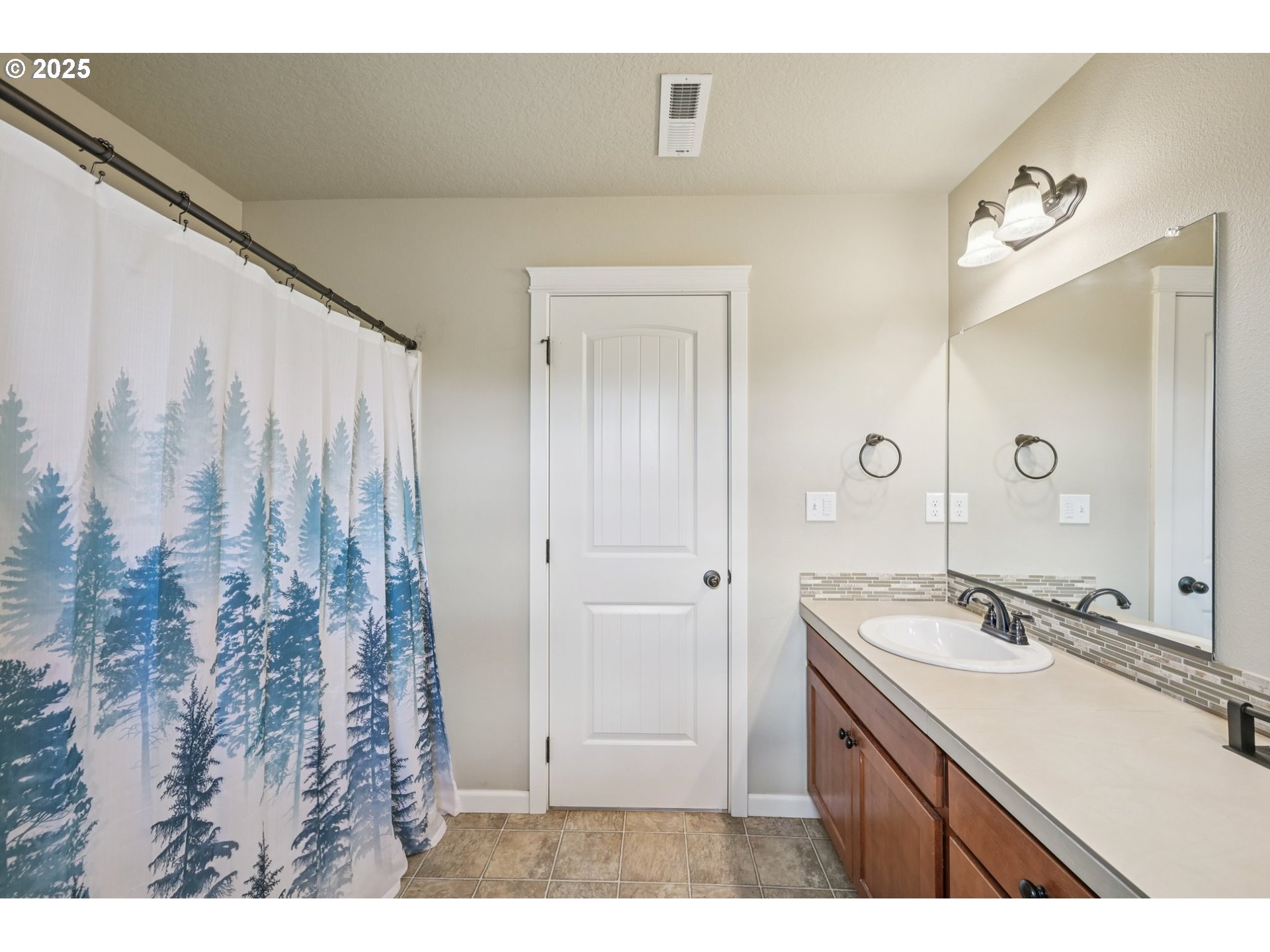 2174 A Street Hubbard, OR 97032 - Photo 21 of 30 a bathroom with a sink and a mirror