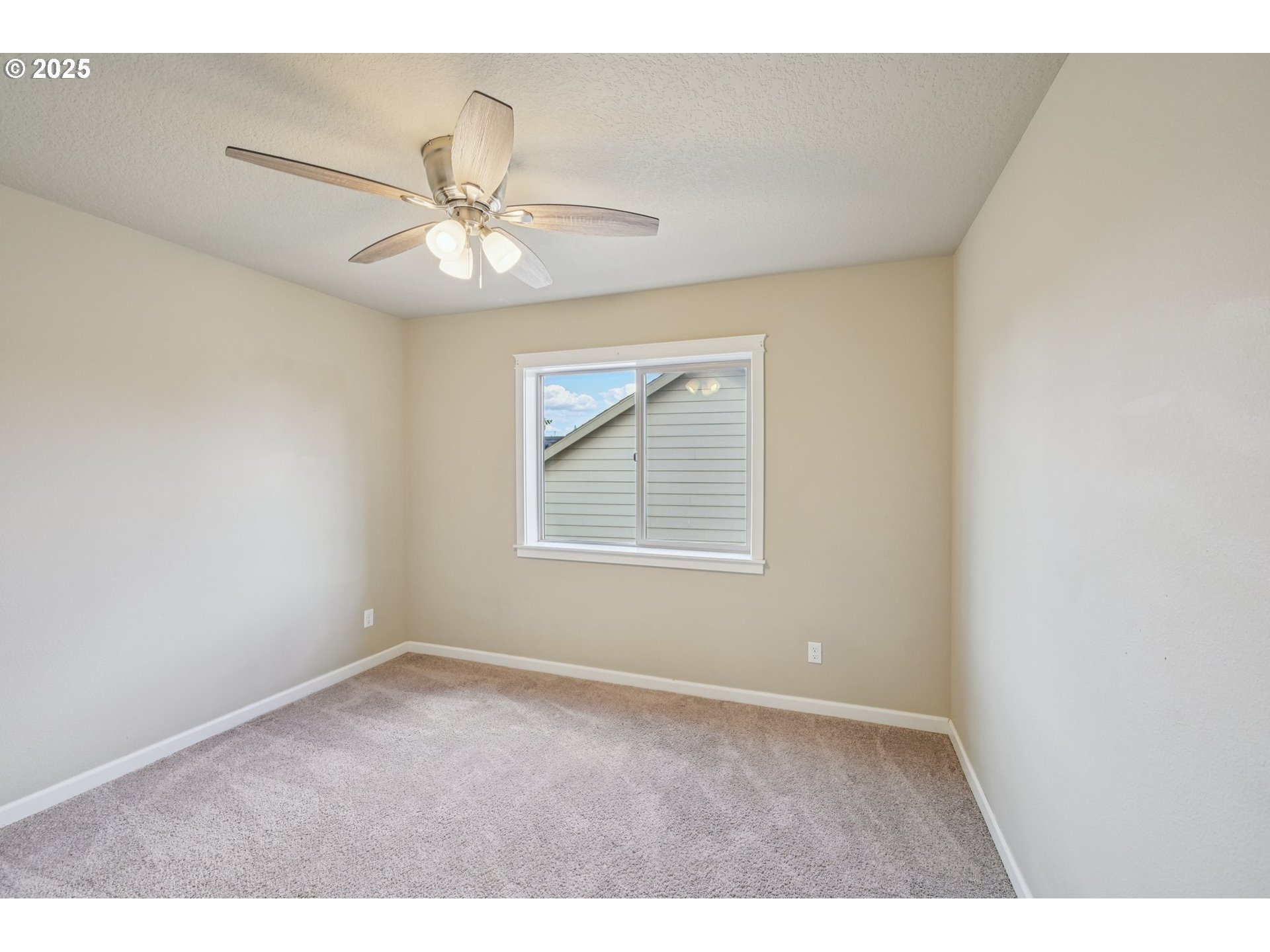 2174 A Street Hubbard, OR 97032 - Photo 22 of 30 a view of an empty room with a window