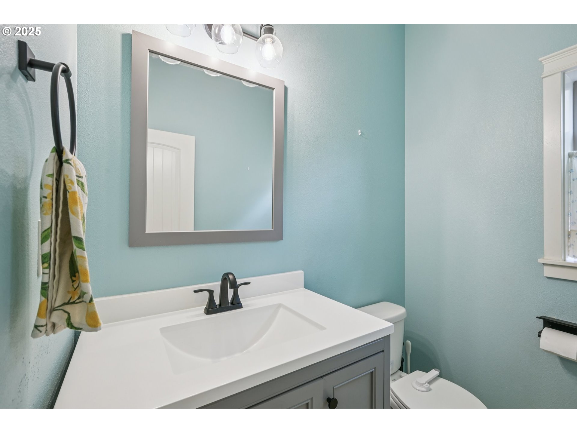 2174 A Street Hubbard, OR 97032 - Photo 8 of 30 a bathroom with a sink vanity and a mirror