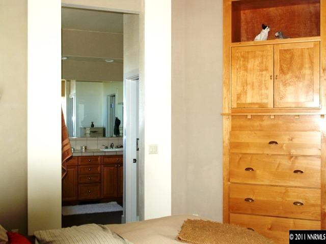 5061 Fall Colors Court Reno, NV 89519 - Photo 6 of 9 a bathroom with a sink and a mirror
