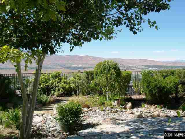 5061 Fall Colors Court Reno, NV 89519 - Photo 9 of 9 a view of a garden with a bench