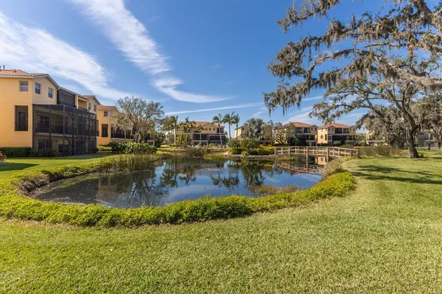 a living room with furniture a table and chairs