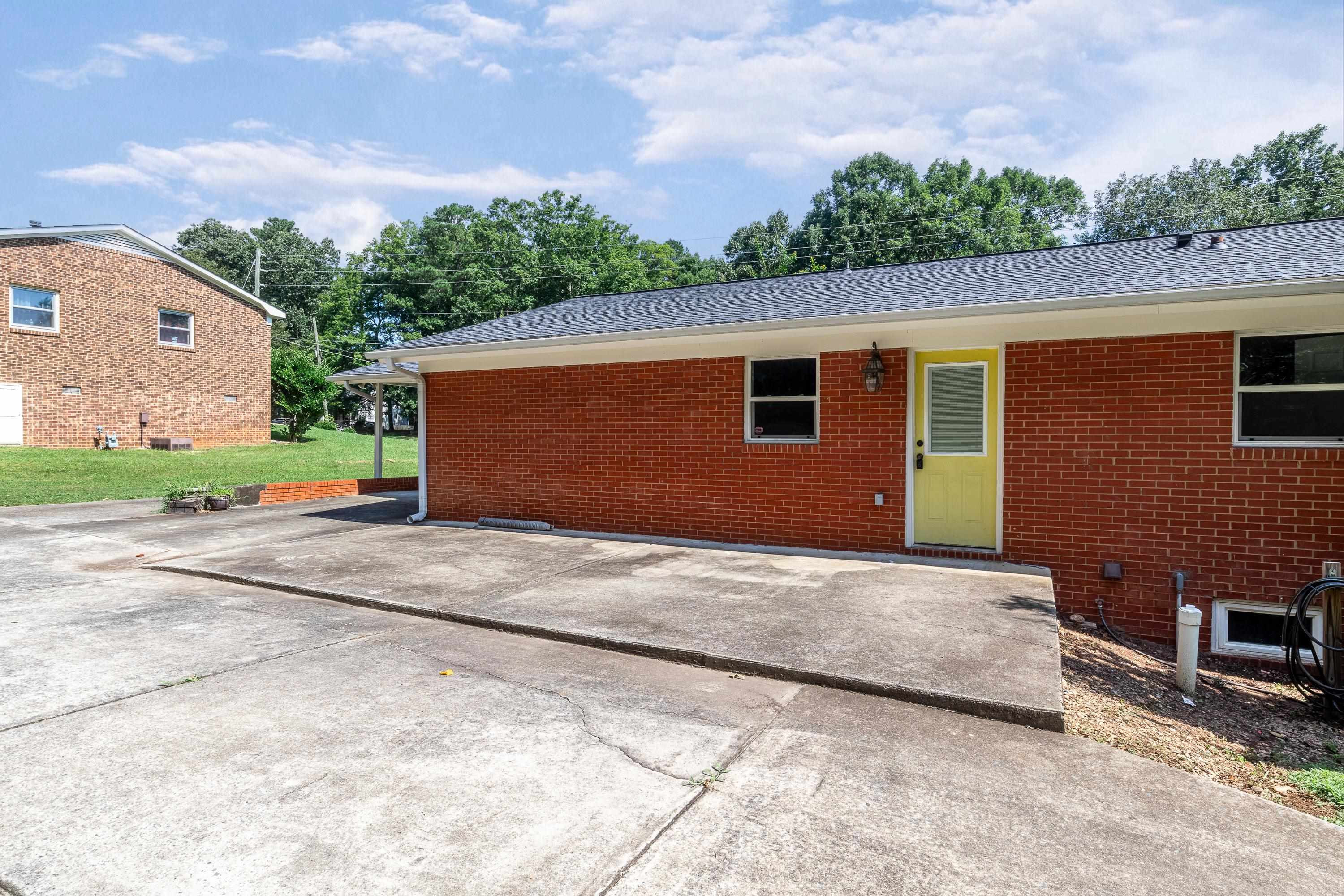 3521 Lynn Road Raleigh, NC 27613 - Photo 27 of 35 Imagine a nice patio table and grill on this patio area while you enjoy the spacious backyard. The kids are able to ride their bikes on the extra parking pad and circle drive or perhaps install a basketball goal. Back Patio