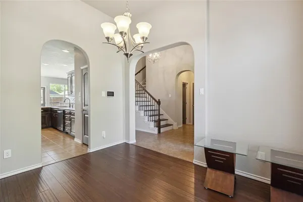 a view of a livingroom with wooden floor