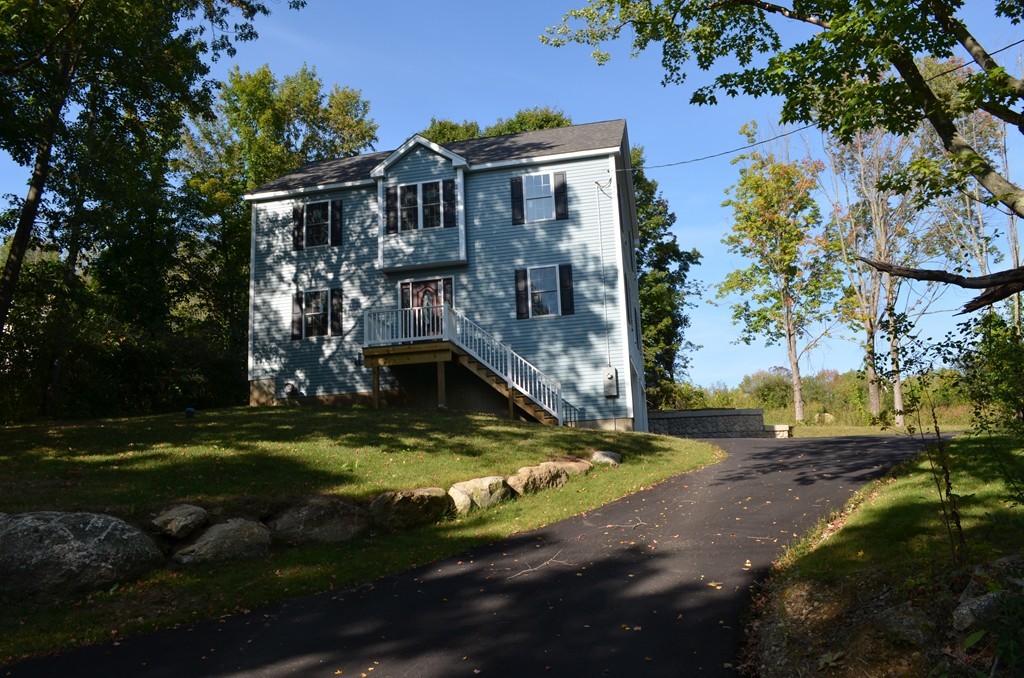 132 Town Farm Road Warren, MA 01083 - Photo 1 of 19 a view of a house with a yard