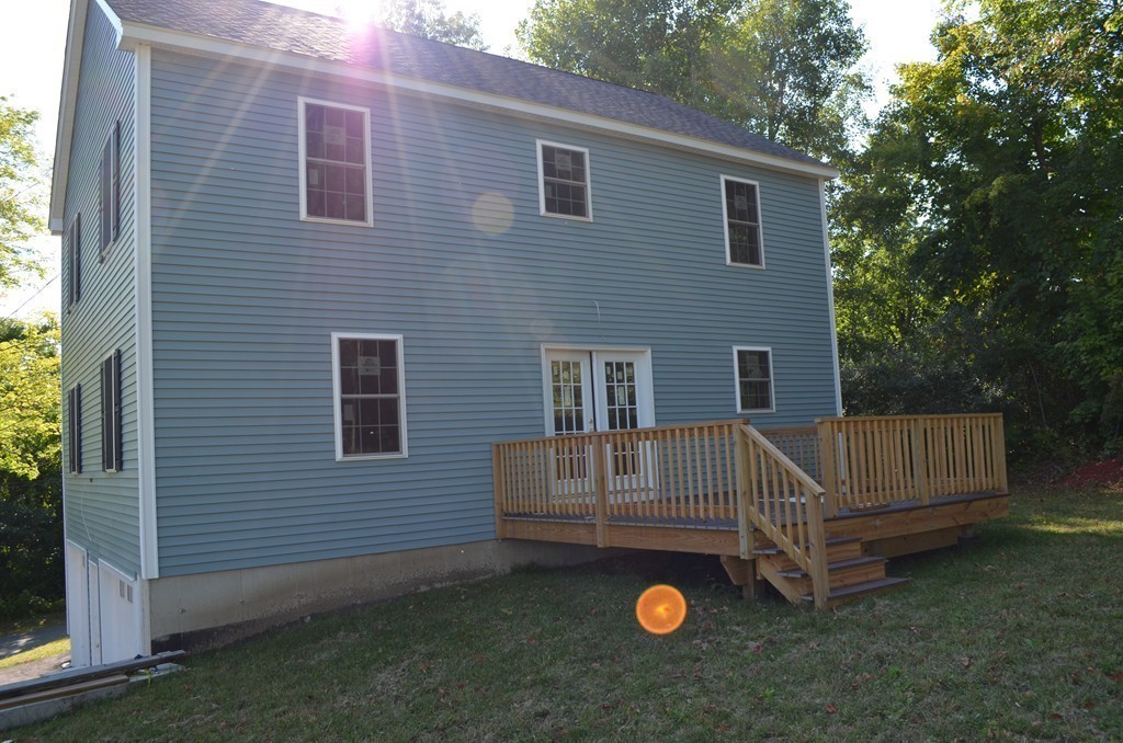 132 Town Farm Road Warren, MA 01083 - Photo 8 of 19 a view of backyard with deck and garden