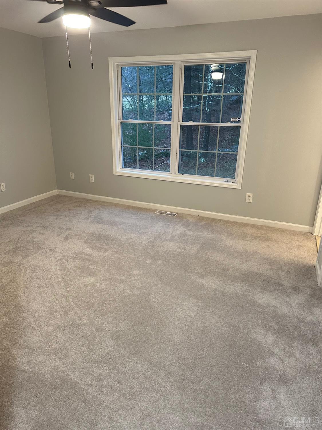 103 Spook Ridge Road Montague, NJ 07827 - Photo 23 of 54 a view of an empty room with a window