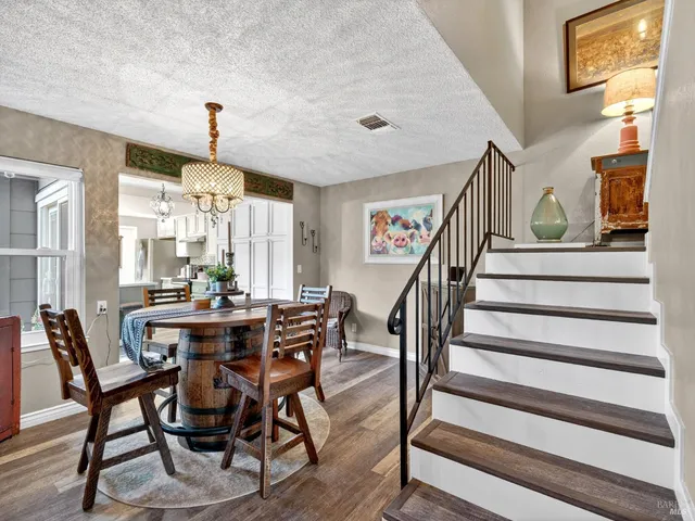 a view of a dining room with furniture