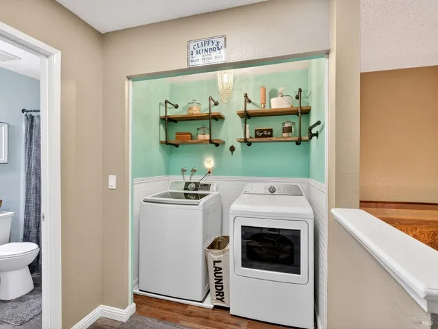 a view of living room with washer and dryer