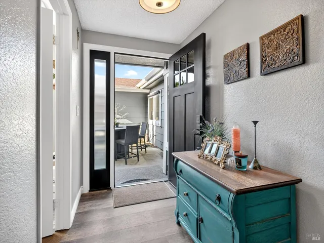 a room with furniture and a mirror