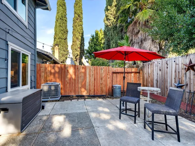 a view of a car parked in front of a building