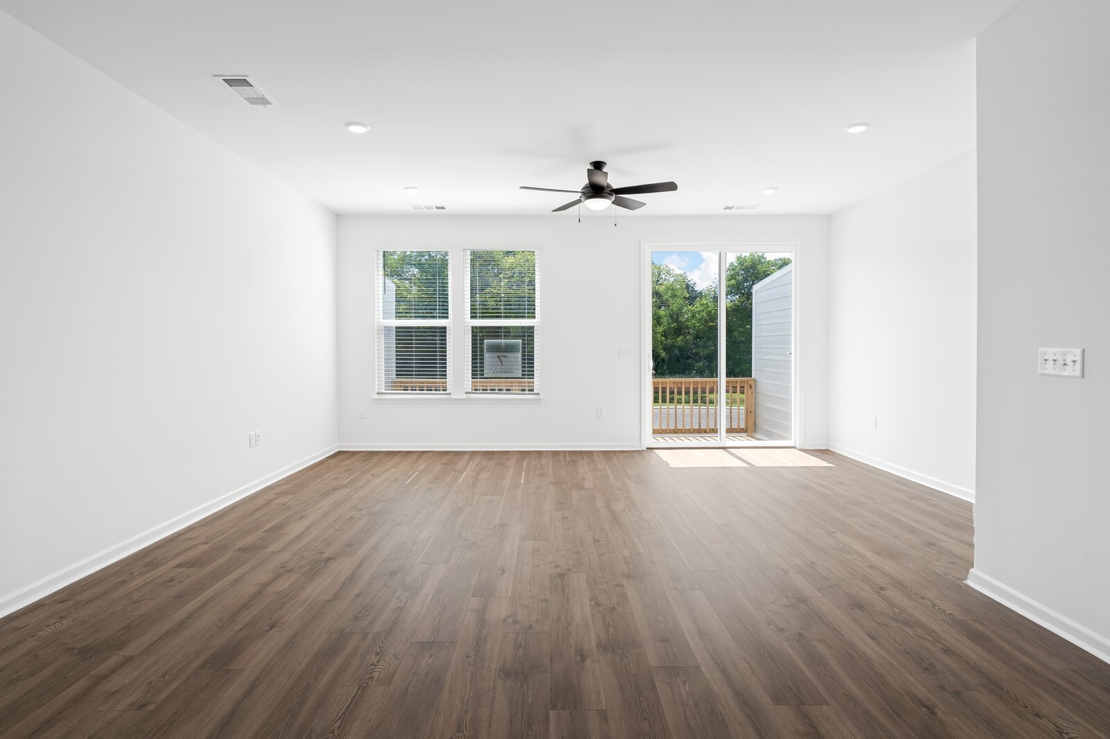 406 Blair Road Smyrna, TN 37167 - Photo 12 of 28 a view of an empty room with wooden floor and a window